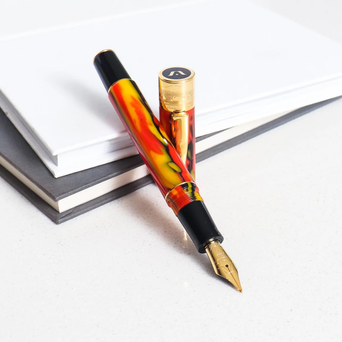 GIOIA Partenope Fountain Ink Pen and Rollerball Pen with an Interchangeable Grip Section, Fiamma Flame Resin Barrel & Cap with Gold Plated Fine Nib and Trims